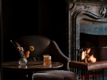 Cocktails by the Fire in Moon Bar